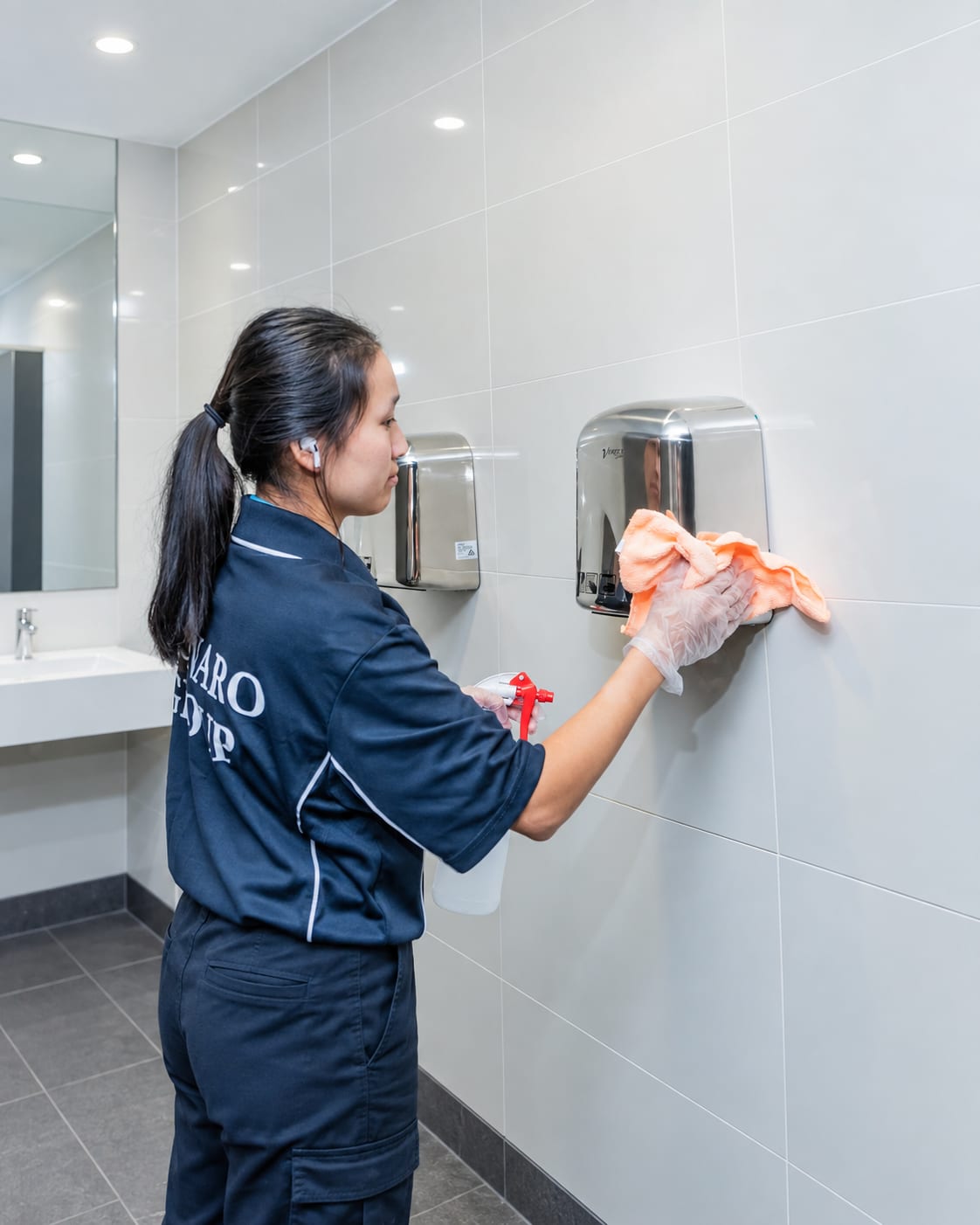 Monaro Group professional cleaning a commercial washroom